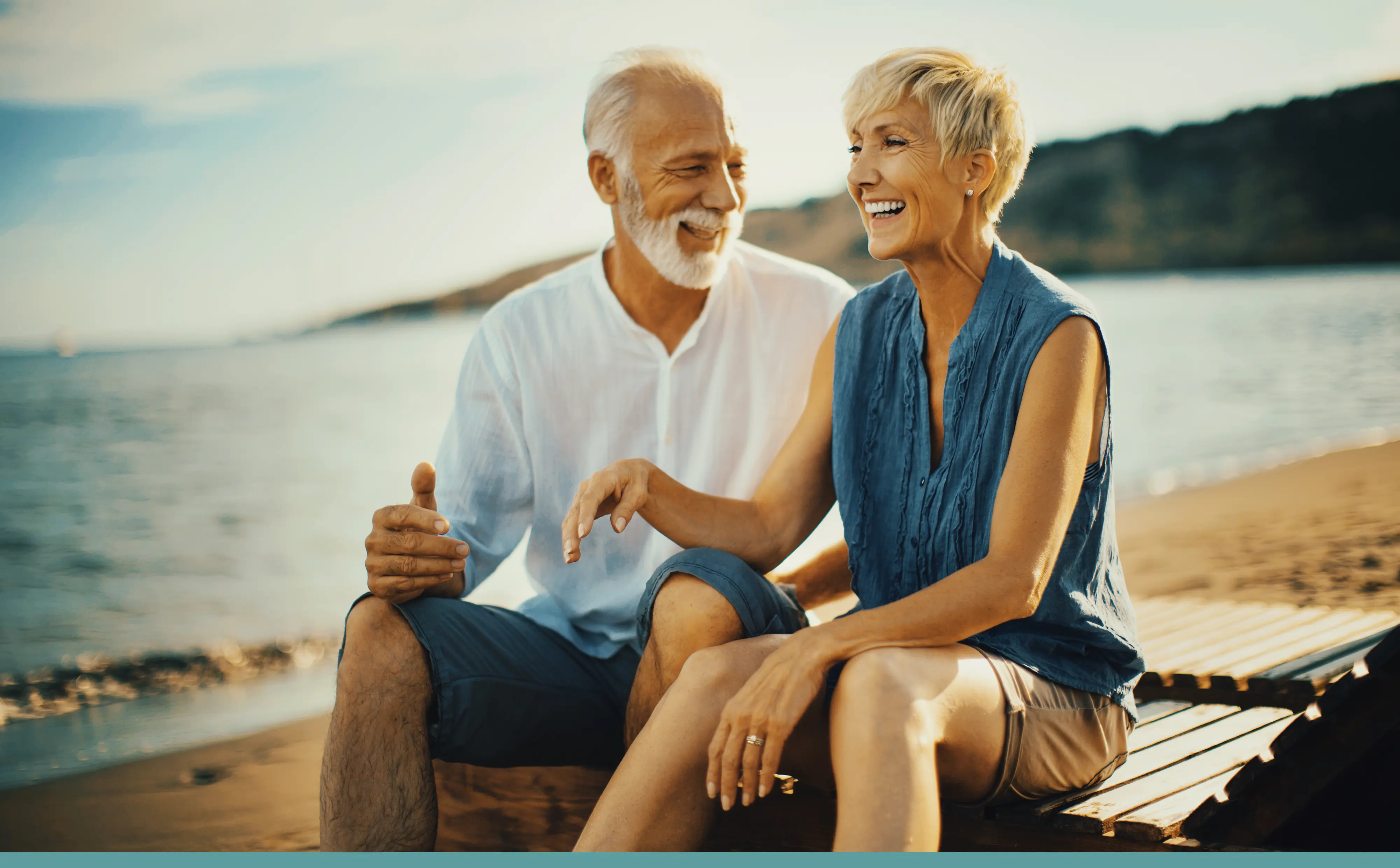 Retired couple on beach